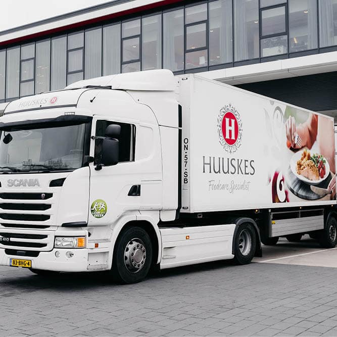 Huuskes vrachtwagen bestickeren